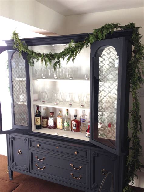 ideas on converting a china cabinet for a bar area